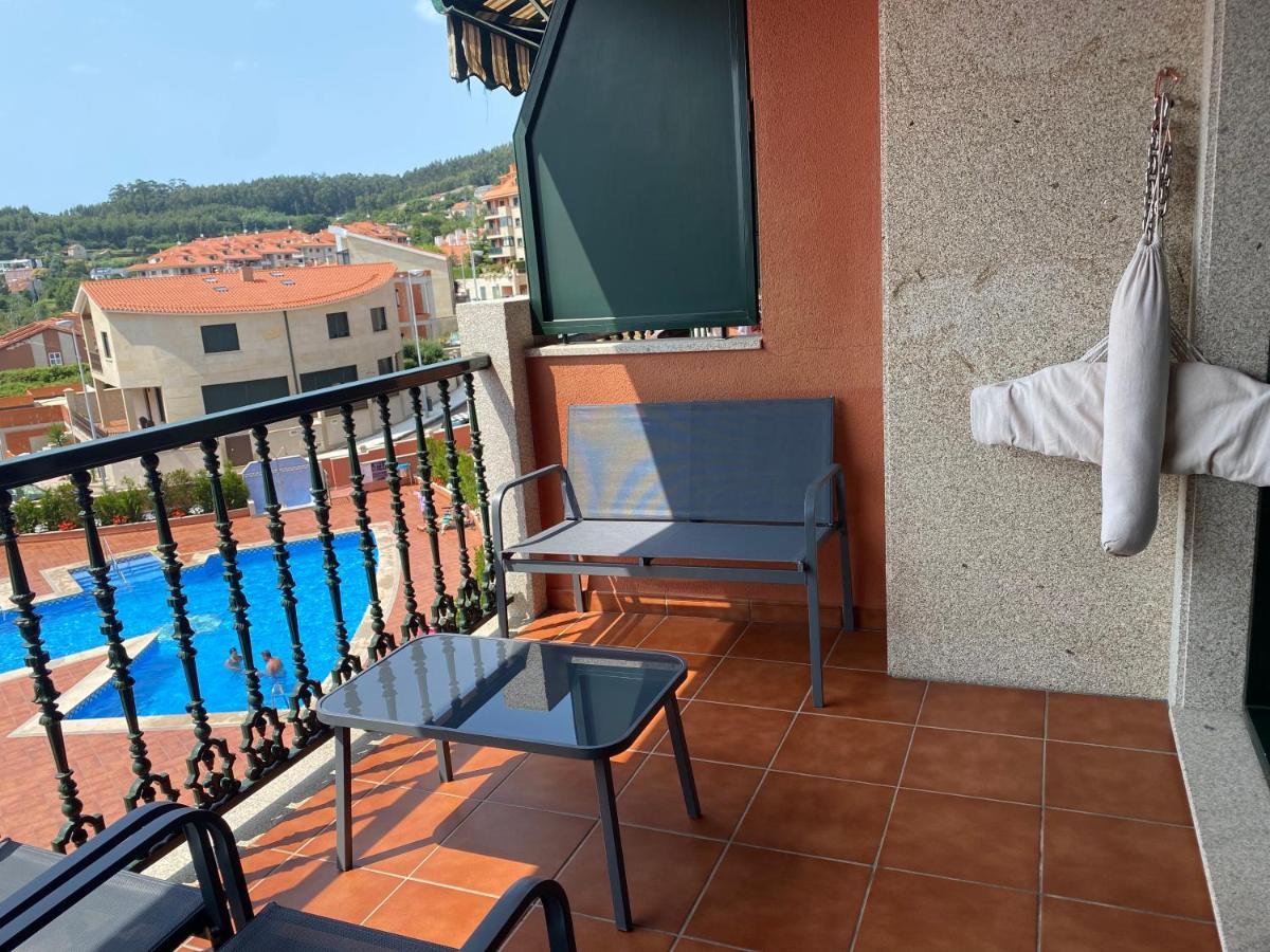 Appartement Apartamento Con Vistas Al Mar, Piscina Y Parking à Sanxenxo Extérieur photo